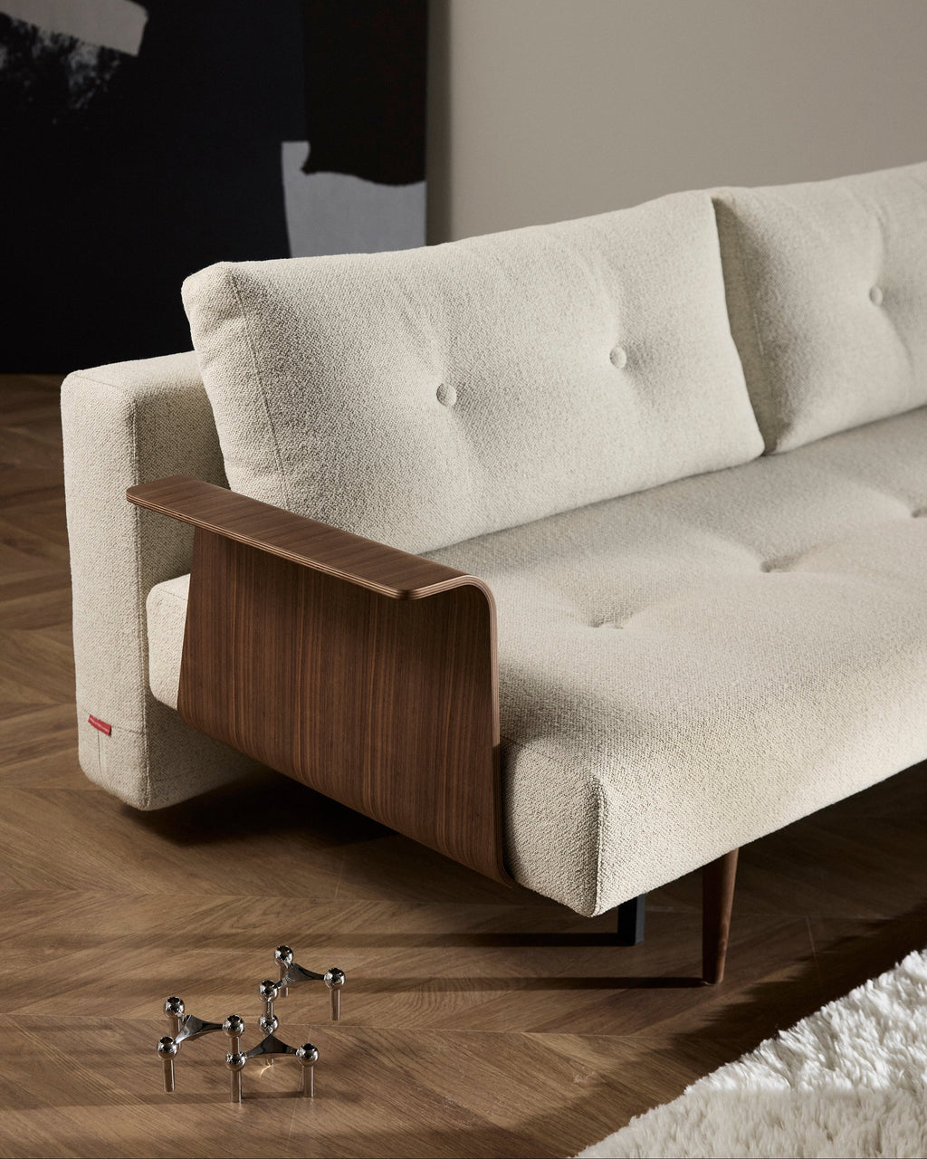 Bras en noyer refondu